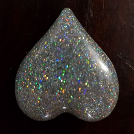 Holographic Glitter in an epoxy resin heart.